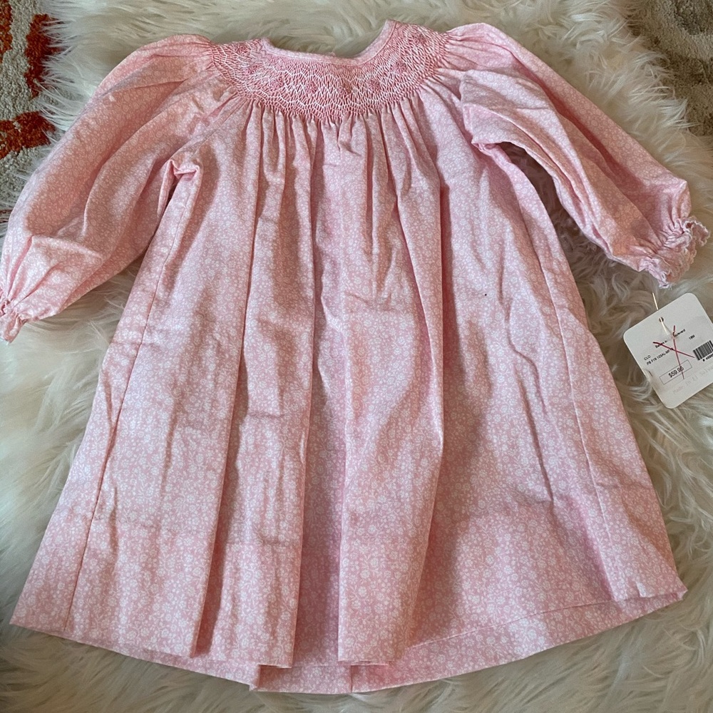 Beautiful pink smocked Petit Bebe dress NWT 18m